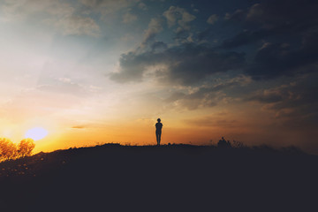 Wall Mural - Young woman relaxing in summer sunset sky outdoor. People freedom style.