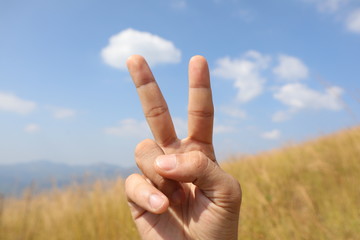 hand on blue sky