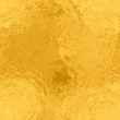 Gold foil seamless texture, metal background