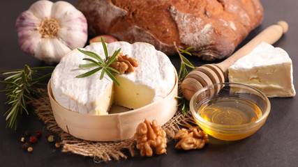 Wall Mural - camembert with bread, walnut and honey
