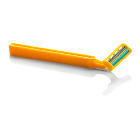 yellow razor isolated on white background