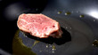 © procinemastock - Two filet mignon steaks being cooked