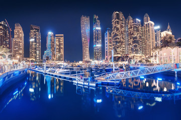 Wall Mural - Parking for luxury yachts and boats in the popular district of Dubai Marina