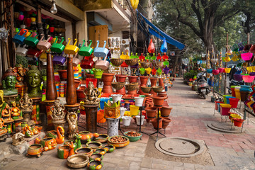 Wall Mural - New Delhi, India - Street market filled with all types of pottery, ceramics, planters and home goods in the Saket neighborhood in South Delhi