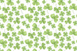 repeat pattern of hand drawn watercolor green shamrock leaves
