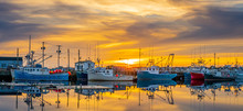 Sunset At The Wharf Where The Lobster Boats Are Berthed.