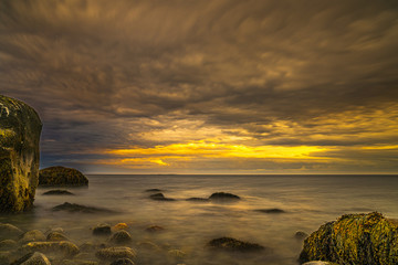 Long exposure seascape along Nova Scotia's rocky seacoast shoreline.