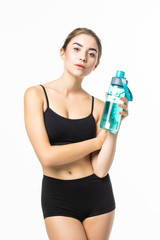 Wall Mural - Portrait of attractive caucasian smiling woman drinking water isolated on white background