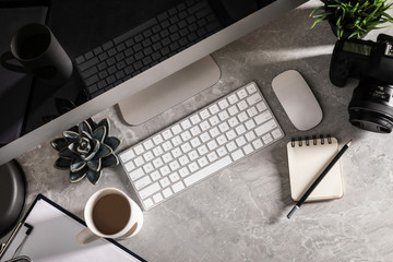 Aufkleber - Designer's workplace with modern computer and camera, flat lay