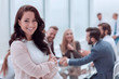 © ASDF - close up. smiling young business woman standing in office