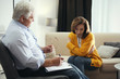 © New Africa - Professional psychotherapist working with patient in office