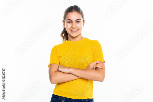 Fotografía Beautiful teen girl student with confident expression, keeps arms folded
