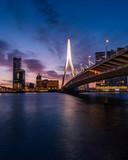 Fototapeta  - Sunrise at Rotterdam, the Netherlands, looking over the river that crosses the city.