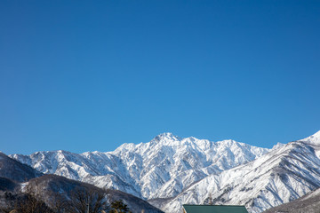 Wall Mural - 青空と自然の雪山の景色コピースペース　mountain