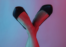 Women's Legs With Classic High Heel Shoes. Creative Pop Art Pink Blue Neon Color. Trendy Gradient Illumination. Night Light