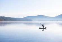 Fisherman On The Little Boat In Lake Yamanaka Morning