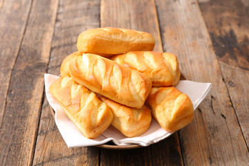 Sticker - bread, bun bread on wood background