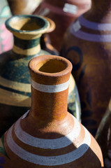 Wall Mural - Mexican ceramic pots with tall necks in market at Old Town