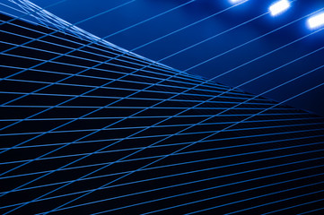 blue abstract technology, science or business background. threads and lines of light intersect and c
