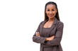 © elnariz - Beautiful female african american business woman CEO in a suit, isolated on white background, standing confidently with arms folded