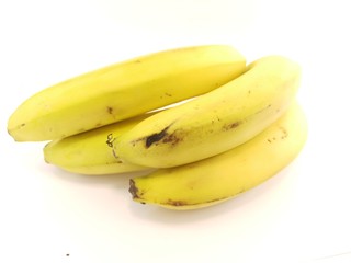 ripe yellow bananas on a white background