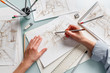 Leinwandbild Motiv Interior designer making hand drawing pencil sketch of a bathroom