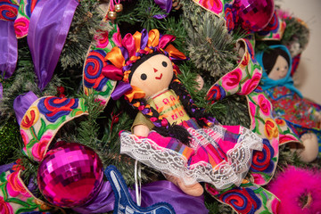 Wall Mural -  Christmas tree with traditional Mexican decorations, rag dolls, traditional colored ribbons of Mexican culture