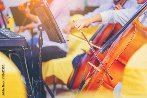 Fotografía Musician is practicing cello in a music practice classroom prepare for performing violin stage