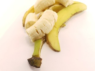 Canvas Print - ripe yellow bananas on a white background