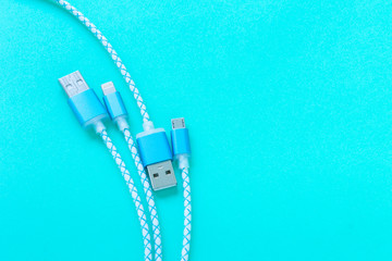 charging cable for smartphone on blue background