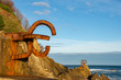 Panoramic of sculptures of the comb of the Wind, at sunrise with blue sky, horizontally, in San Sebastian, Basque Country, Spain
