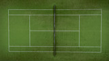 Fototapeta Miasto - Photo of a tennis green field from a height.