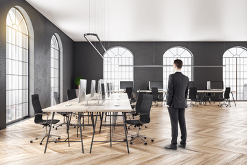 Poster - Businessman standing in coworking office