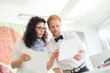 © MDBPIXS - Creative business colleagues discussing over samples in office