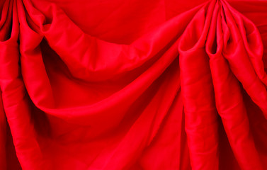 Shine red pearl fabric silk or satin luxury cloth texture. Smooth elegant chiffon background