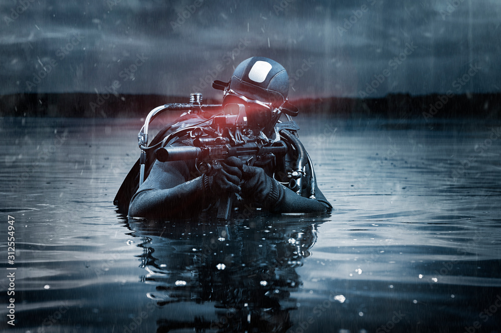 SWAT unit soldier stands waist-deep in water with a machine gun in his hands. The concept of video games, special secret operations. - obrazy, fototapety, plakaty 