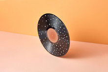 Vintage Vinyl Record With White Dots On A Duotone Background.