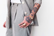 © Lucas Ottone/Stocksy - Tattooed arm
