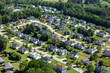 Aerial view of pleasant middle class suburban homes and streets near Atlanta Georgia.  