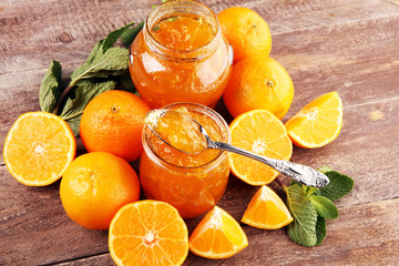 Wall Mural - mandarin homemade jam marmelade in a glass jar. orange marmelade