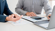 © MIND AND I - Administrator business man financial inspector and secretary making report calculating balance. Internal Revenue Service checking document. Audit concept