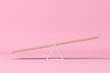 Minimal concept. outstanding slope seesaw on pink background. 3d rendering  