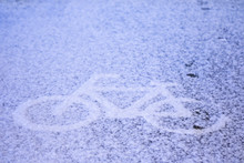 Bike Symbol On Bike Lane With Snow Cover