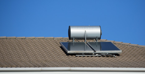 Poster - solar heater panels on the roof