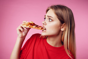 Wall Mural - portrait of young woman eating cake