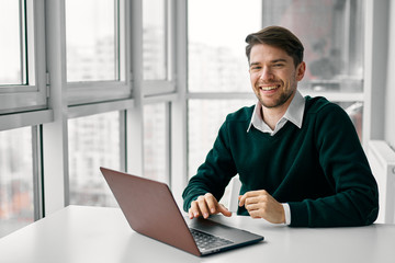 businessman working on laptop in office