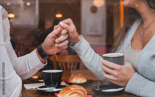 Cuadros en Lienzo dating, romantic date in restaurant for couple, man and woman holding hands