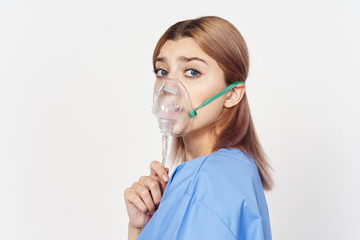 Wall Mural - little girl in a medical mask