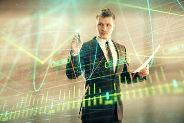 Wall Mural - Businessman and forex graph hologram. Double exposure. Concept of financial education and analysis