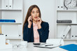 © SHOTPRIME STUDIO - businesswoman talking on phone in office